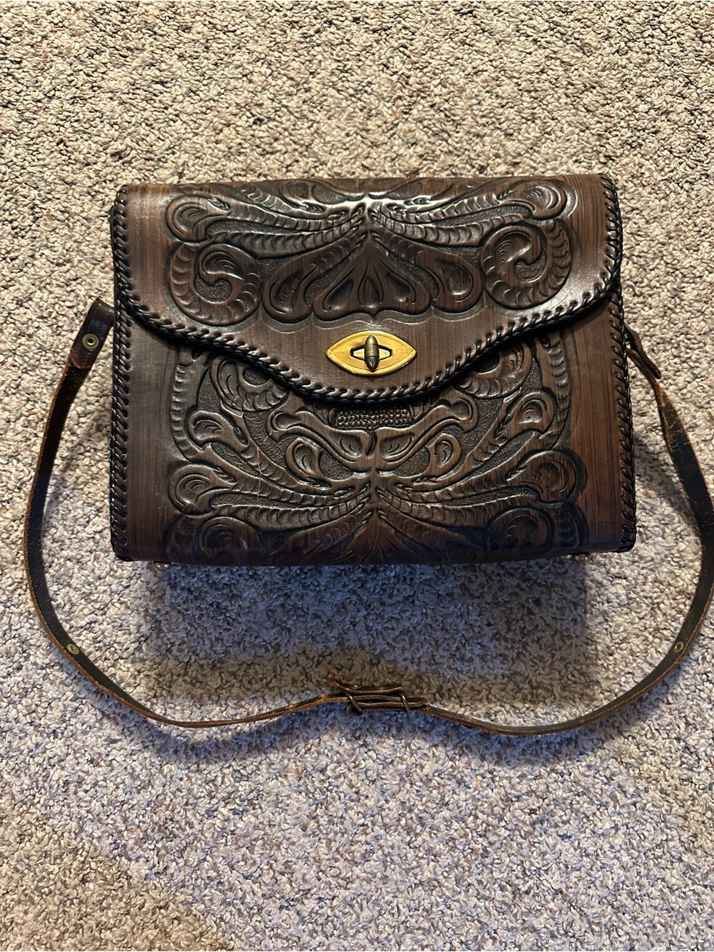 Vintage Hand-Tooled Brown Leather Crossbody Bag with Brass Turn Lock
